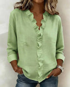 Ruffled blouse with a V-neck