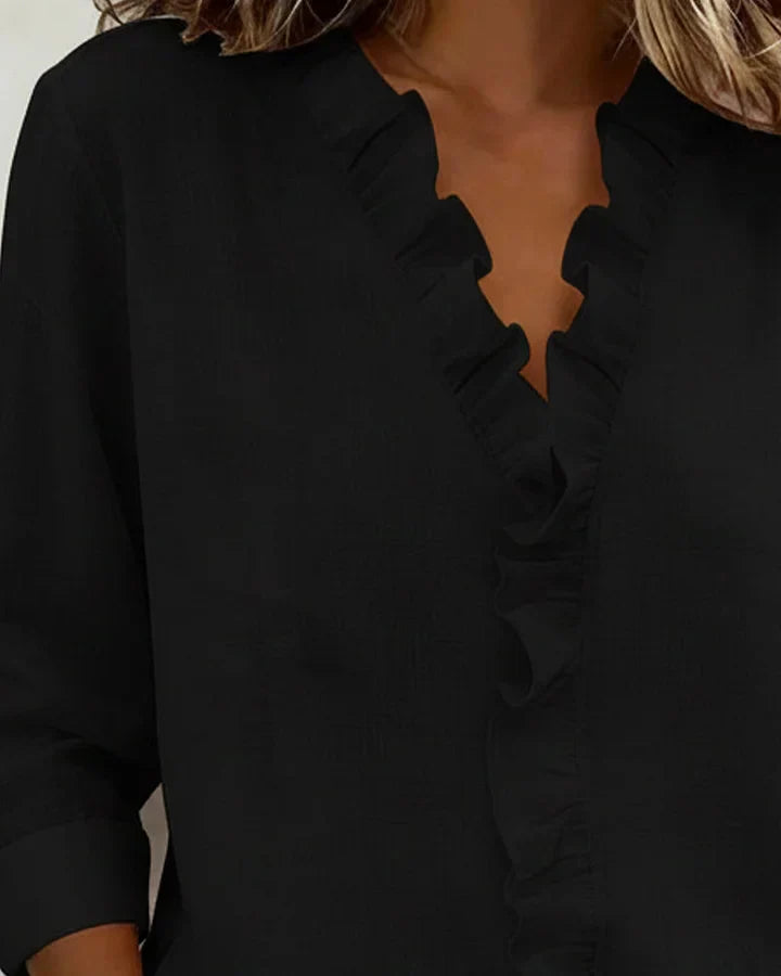 Ruffled blouse with a V-neck