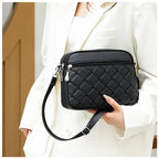 The Erica Silver-Tone Vegan Leather Crossbody Bag